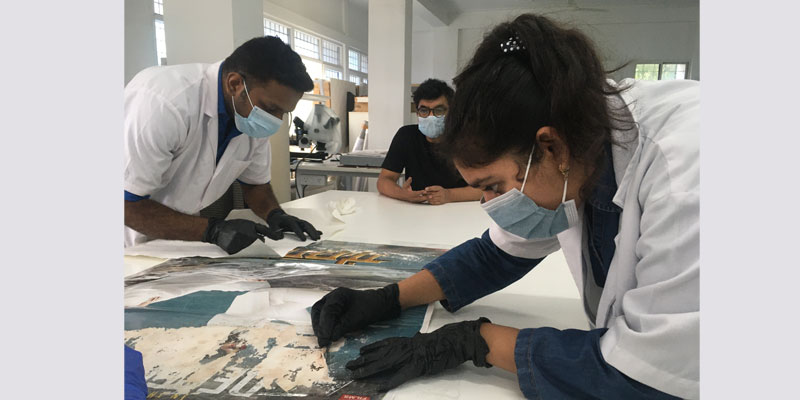 Restoring a damaged digital film poster
